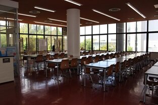 ネーミングライツ愛和会館_学生ホール内観1(3-2)313.JPG